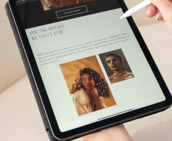 Tablet showing a jewellery brand website being reviewed with stylus, symbolising Marketing Valley’s collaborative design process.