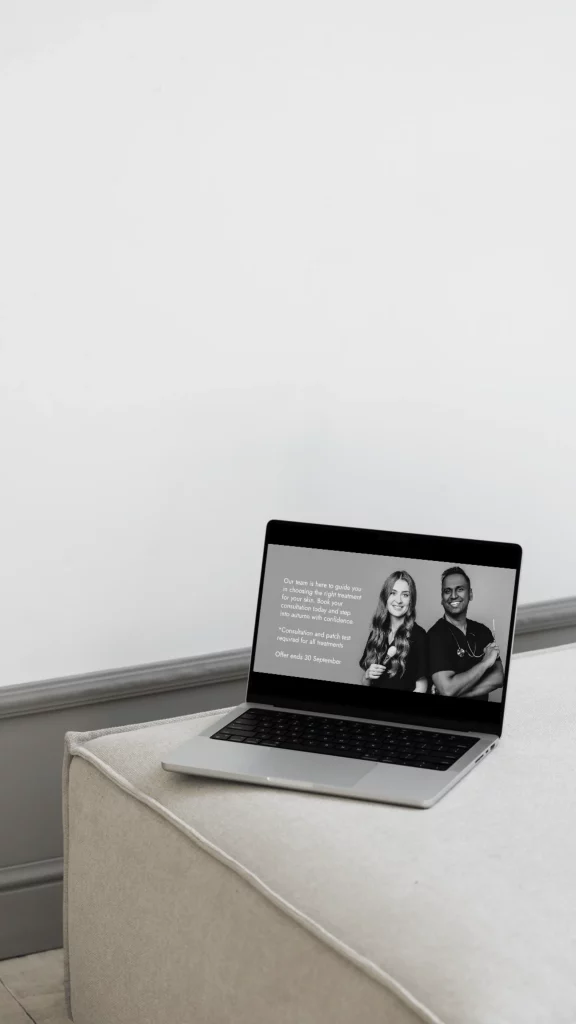 Rejuvena email marketing campaign featuring clinic team and autumn offer message on laptop screen